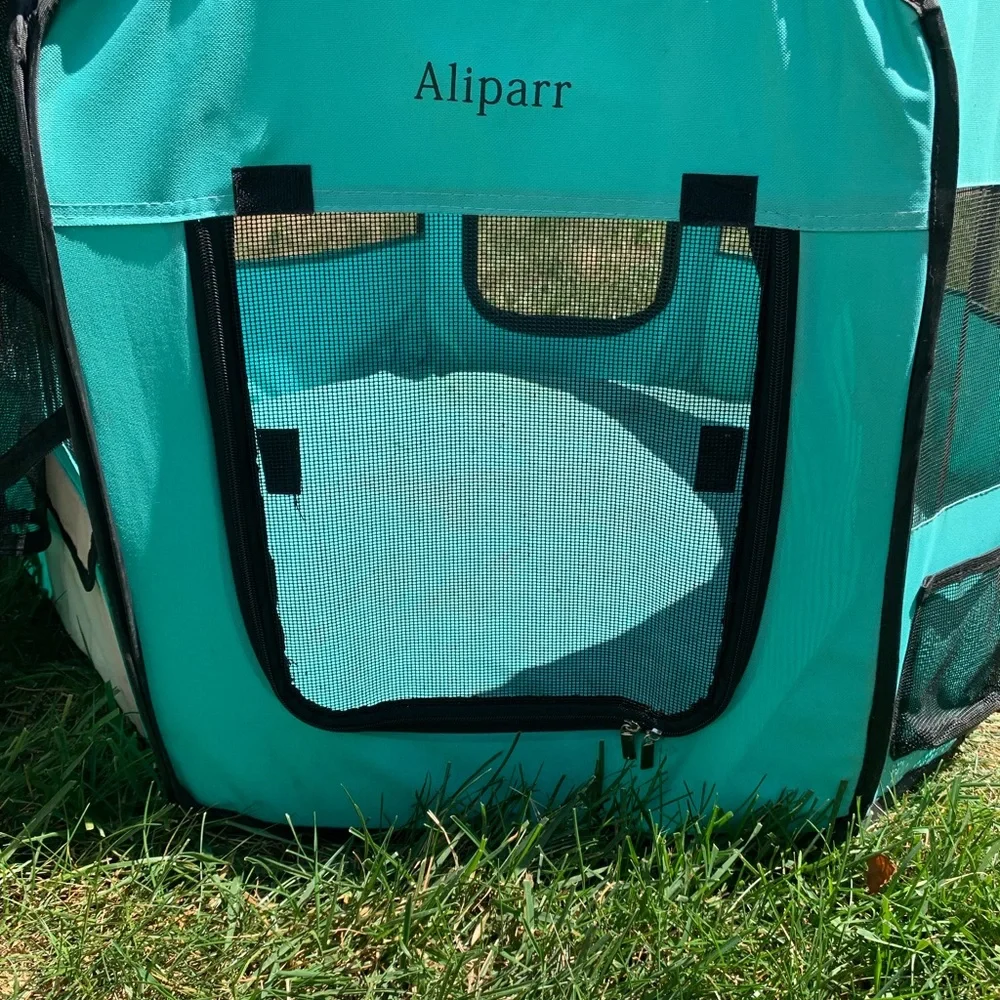 Used Aliparr animal safe zone with zipper top. It had some wear needs cleaned.